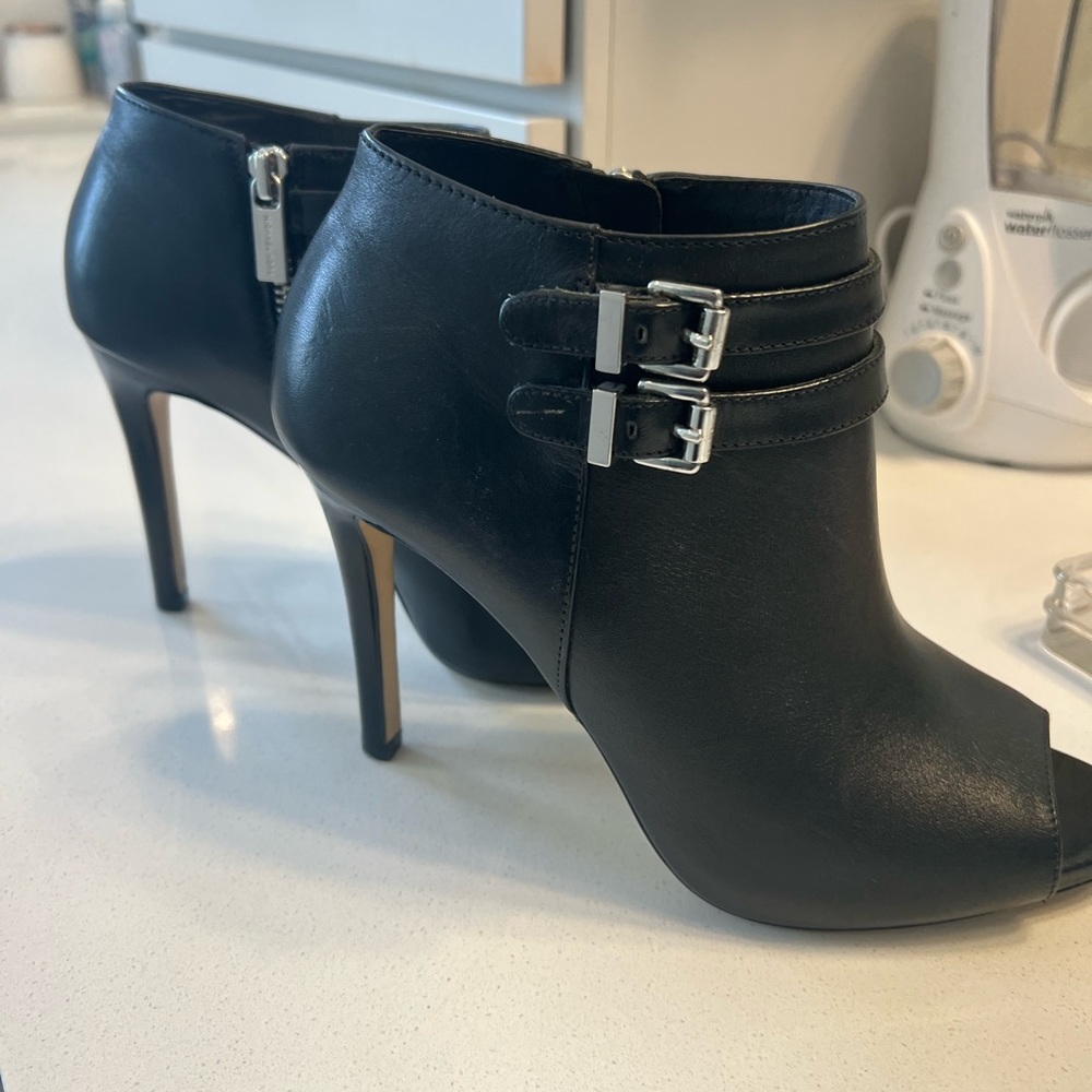 Michael Kors Peep-toe leather ankle boots.